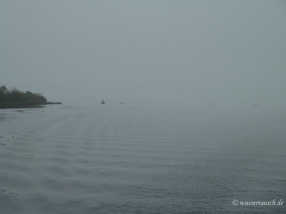 Boats disappearing in fog