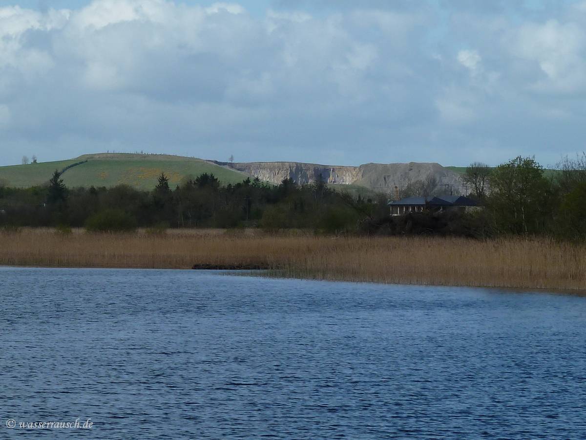 Grange with quarry in the background